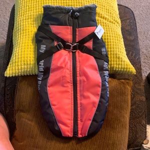 Brand New, never worn, dog jacket, soft & warm on inside. Reflective &waterproof